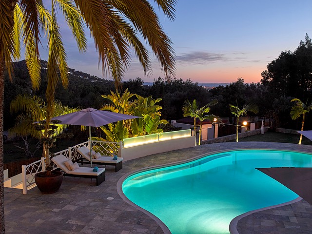 villa with pool in ibiza at night time